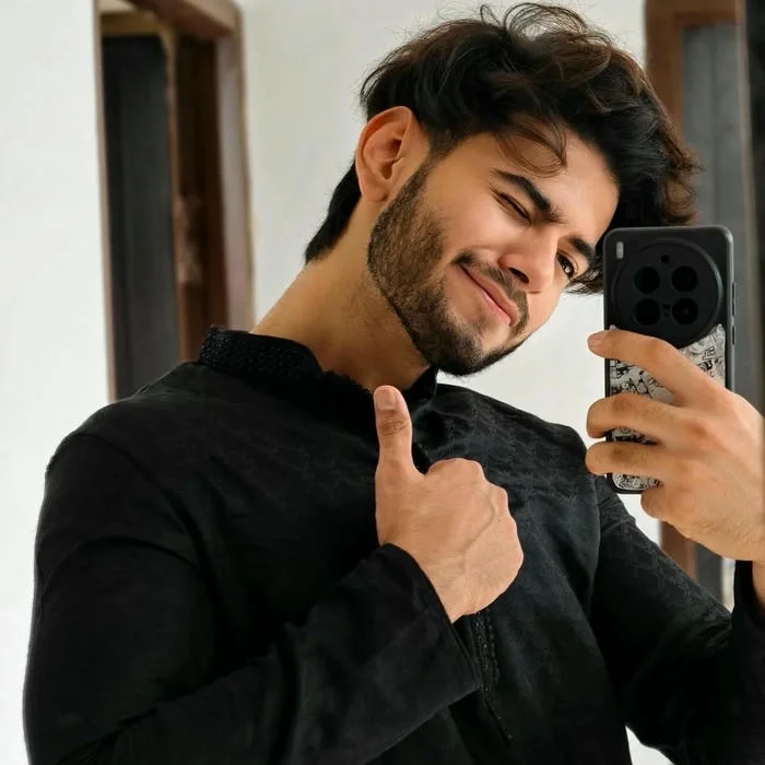 Punjabi boy dp stylish man taking mirror selfie in black 1